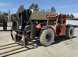 2014 JLG G10-55A telehandler with 55-foot lift height, 10,000 lb capacity, stabilizers, and solid rubber tires, for sale at Bar None Auction in Fontana, California